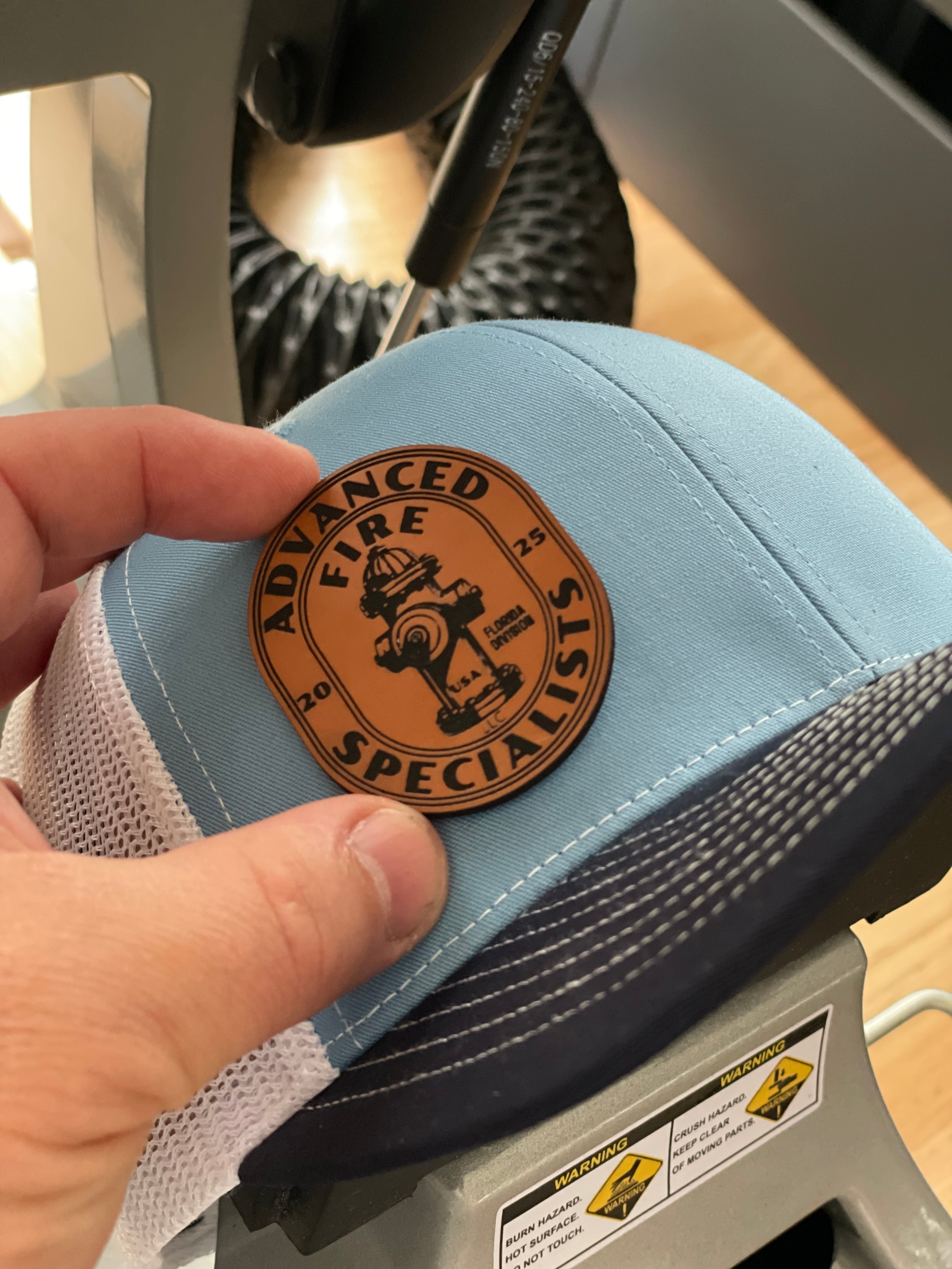 Applying a Leatherette Patch to a Hat.
